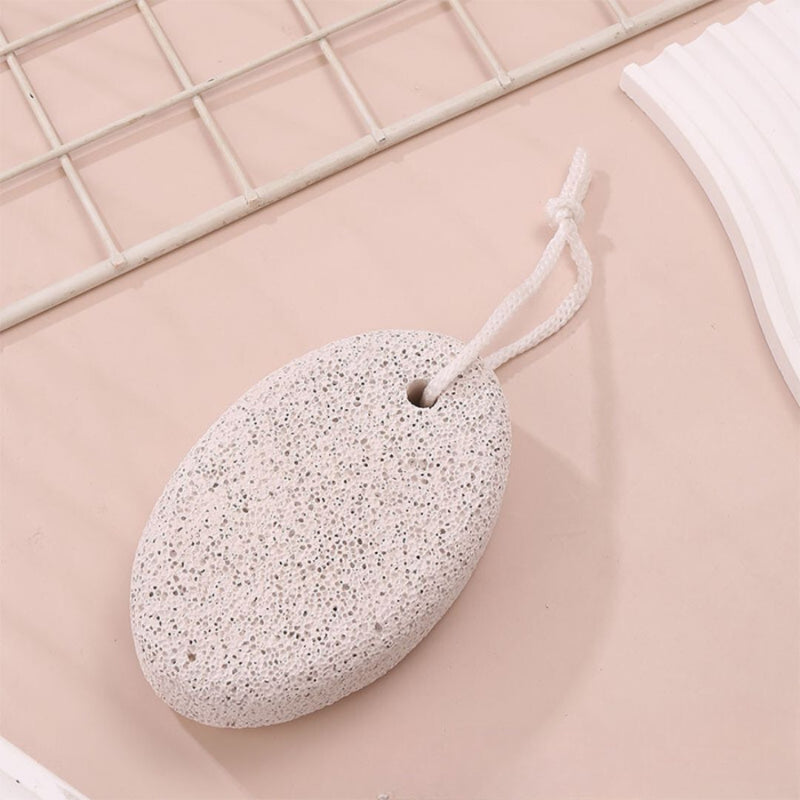 White oval pumice stone for foot care and pedicure routine | Cupindy