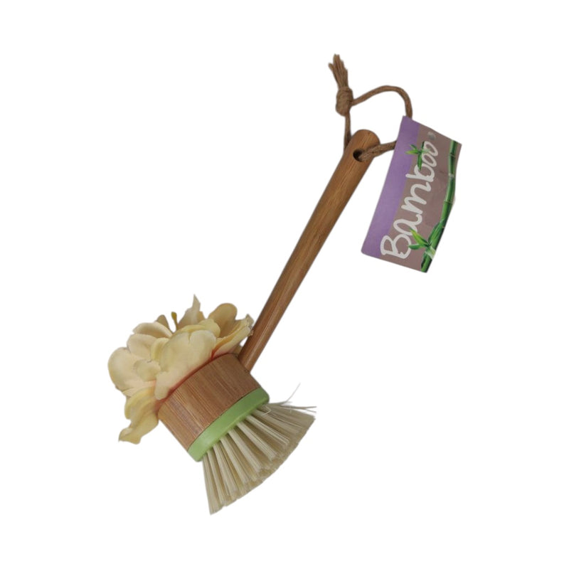 Bamboo dish brush with a scrubber head and a tag labeled 'Bamboo' on a white background.