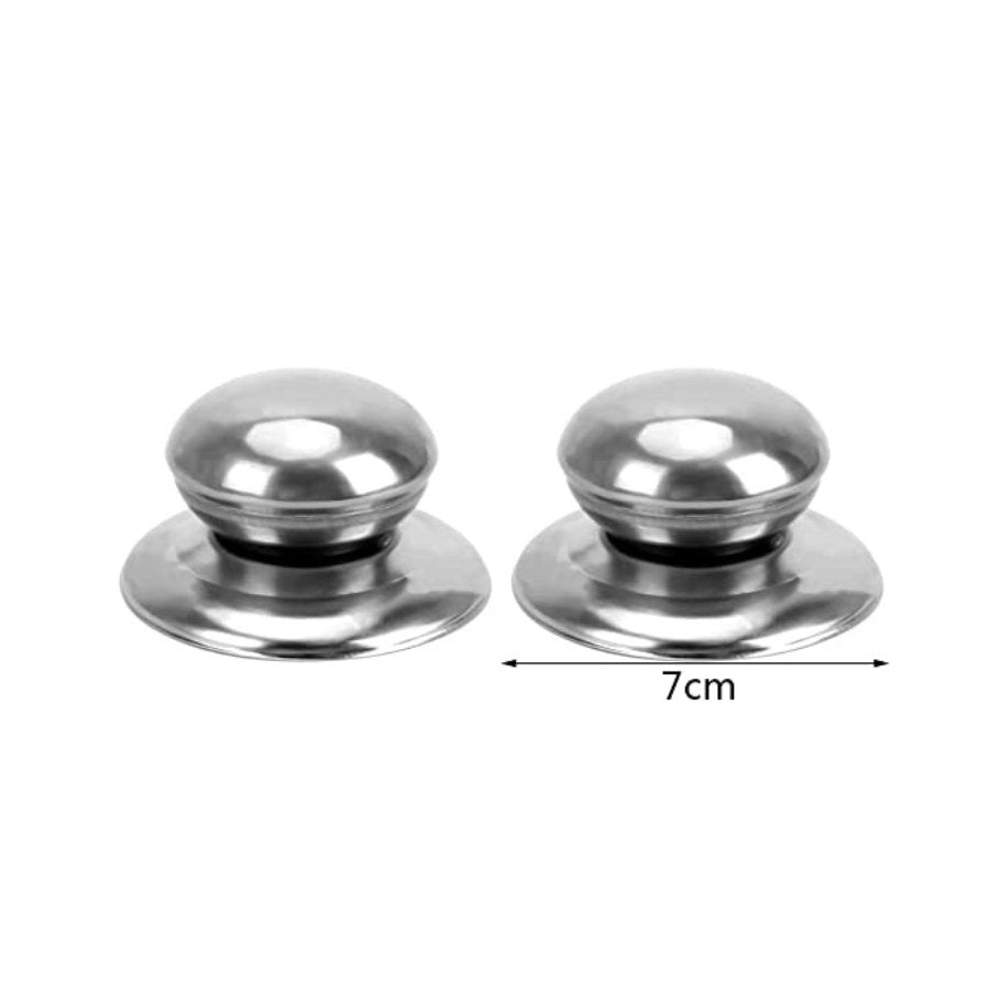Set of stainless steel knobs for pot lids, enhancing kitchen cookware.