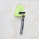 Convenient suction cup razor holder attached to a bathroom wall.